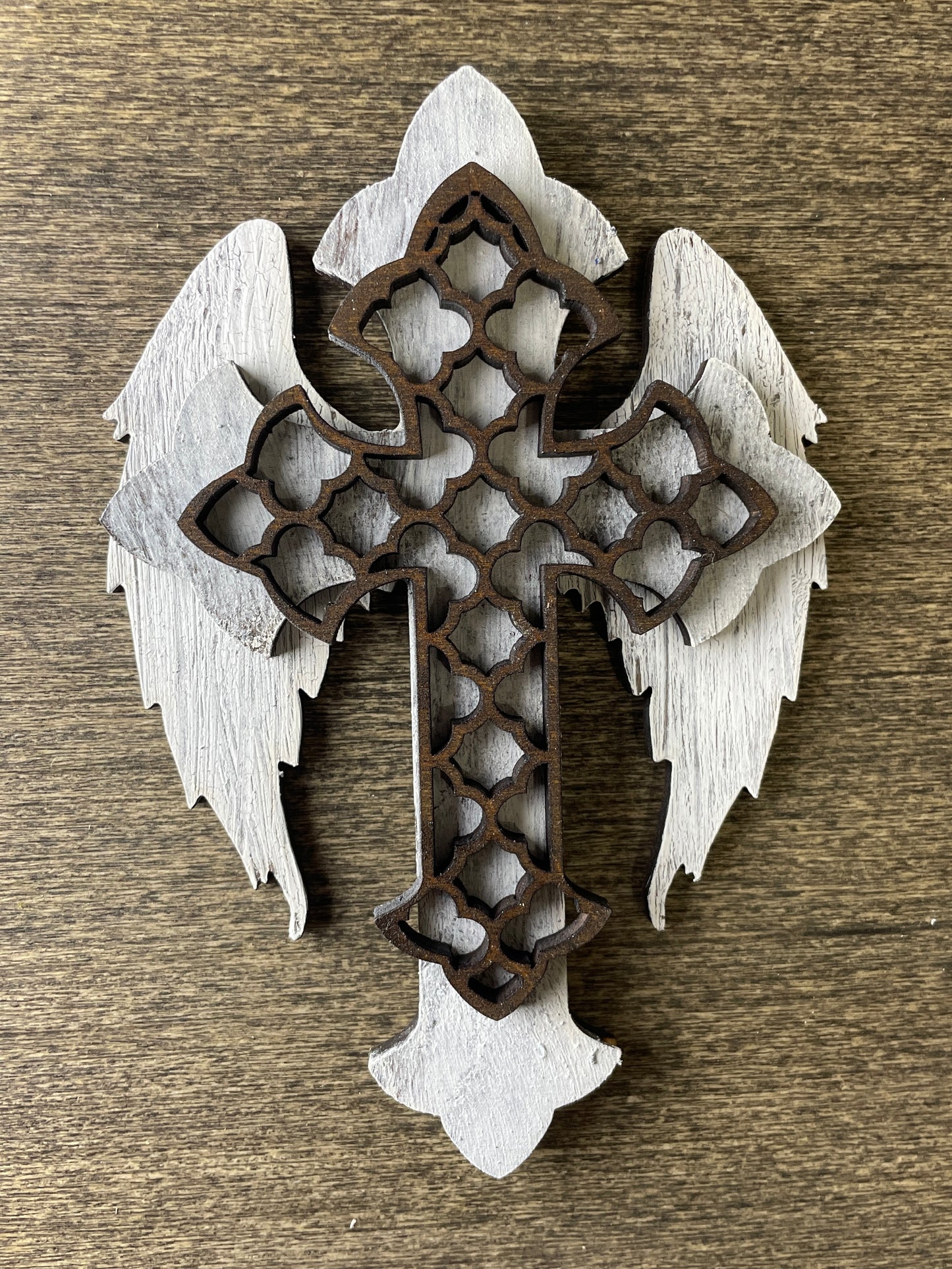 Cross with white wings