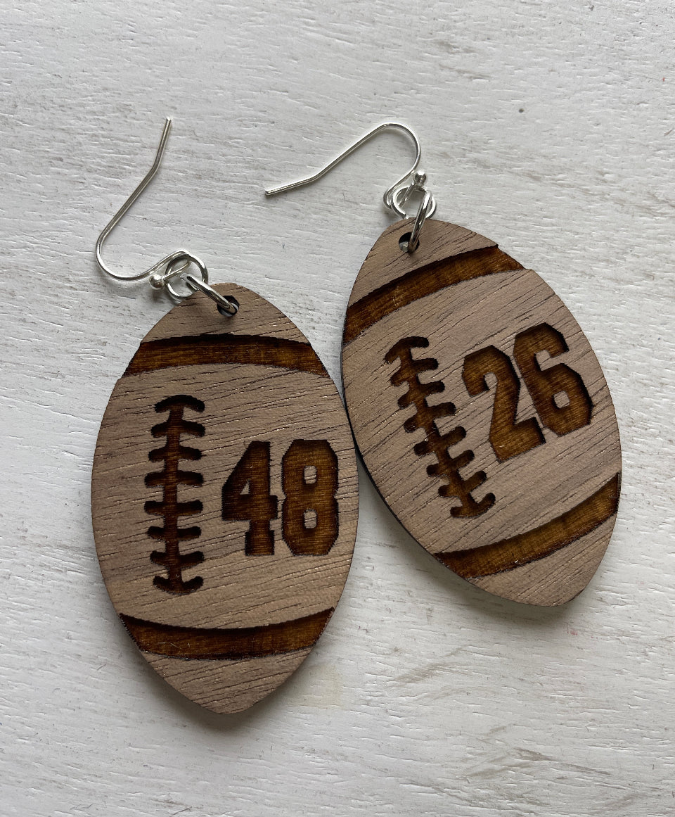 football  shape earring with engraved number
