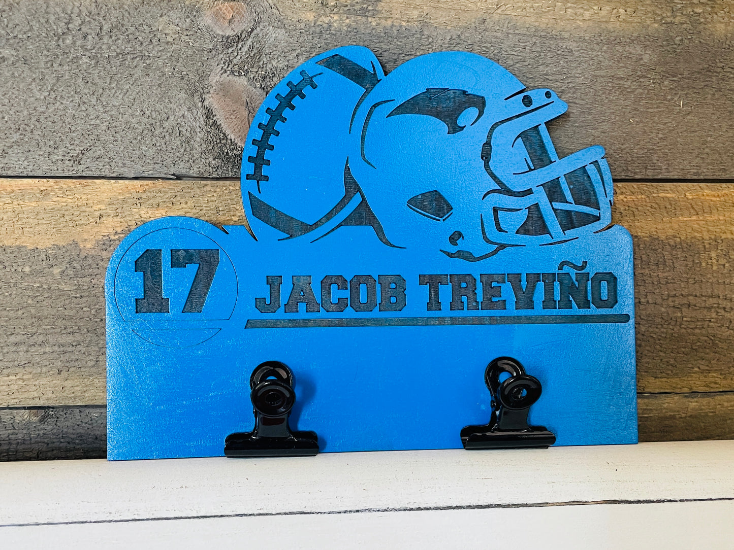 Football sign with metal clip