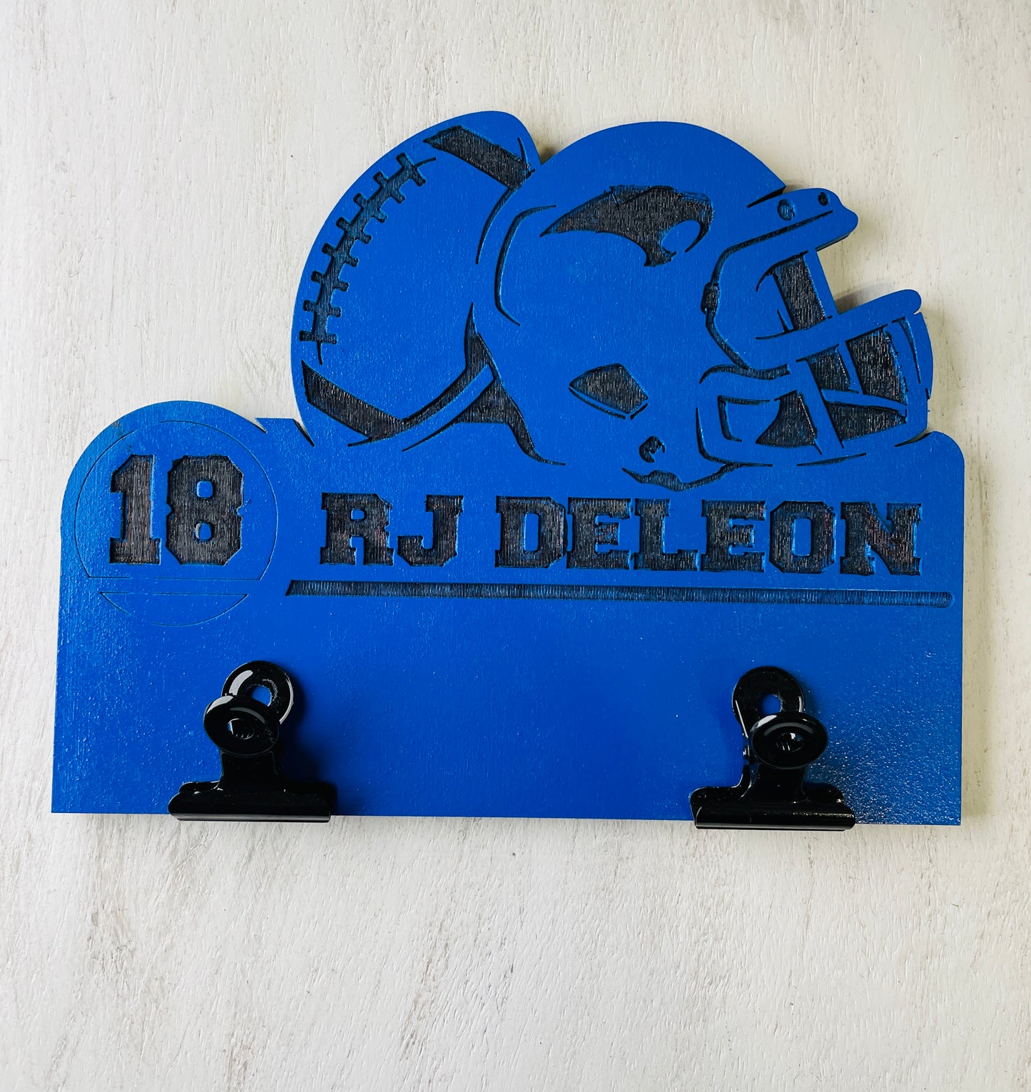 Football sign with metal clip